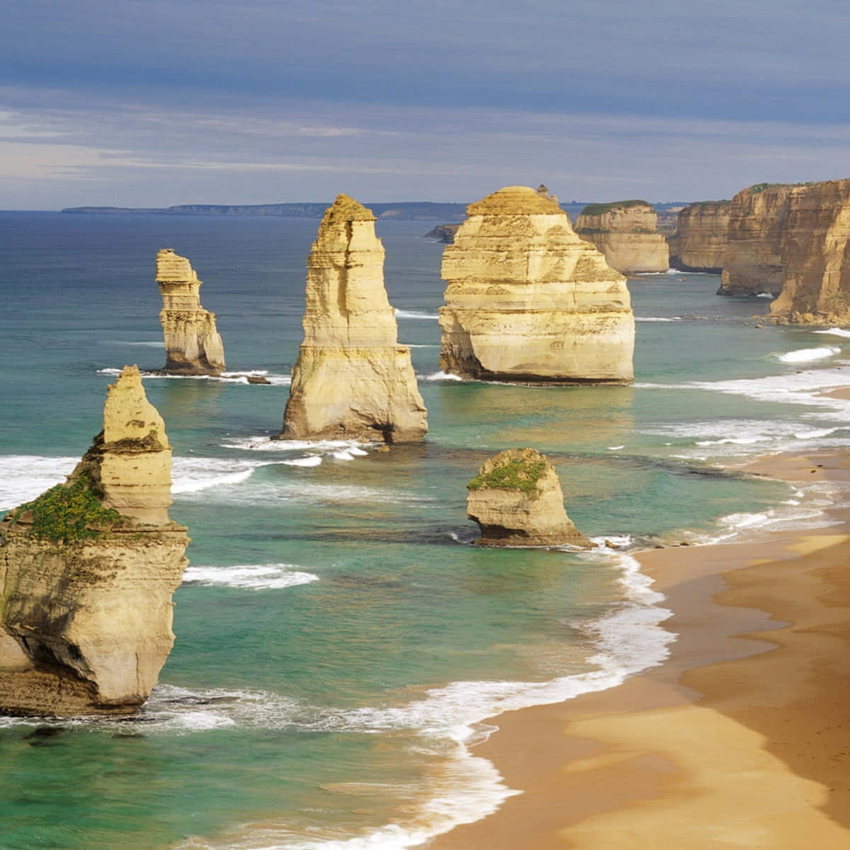 Twelve Apostles In Victoria Australia During Magic Hour Background