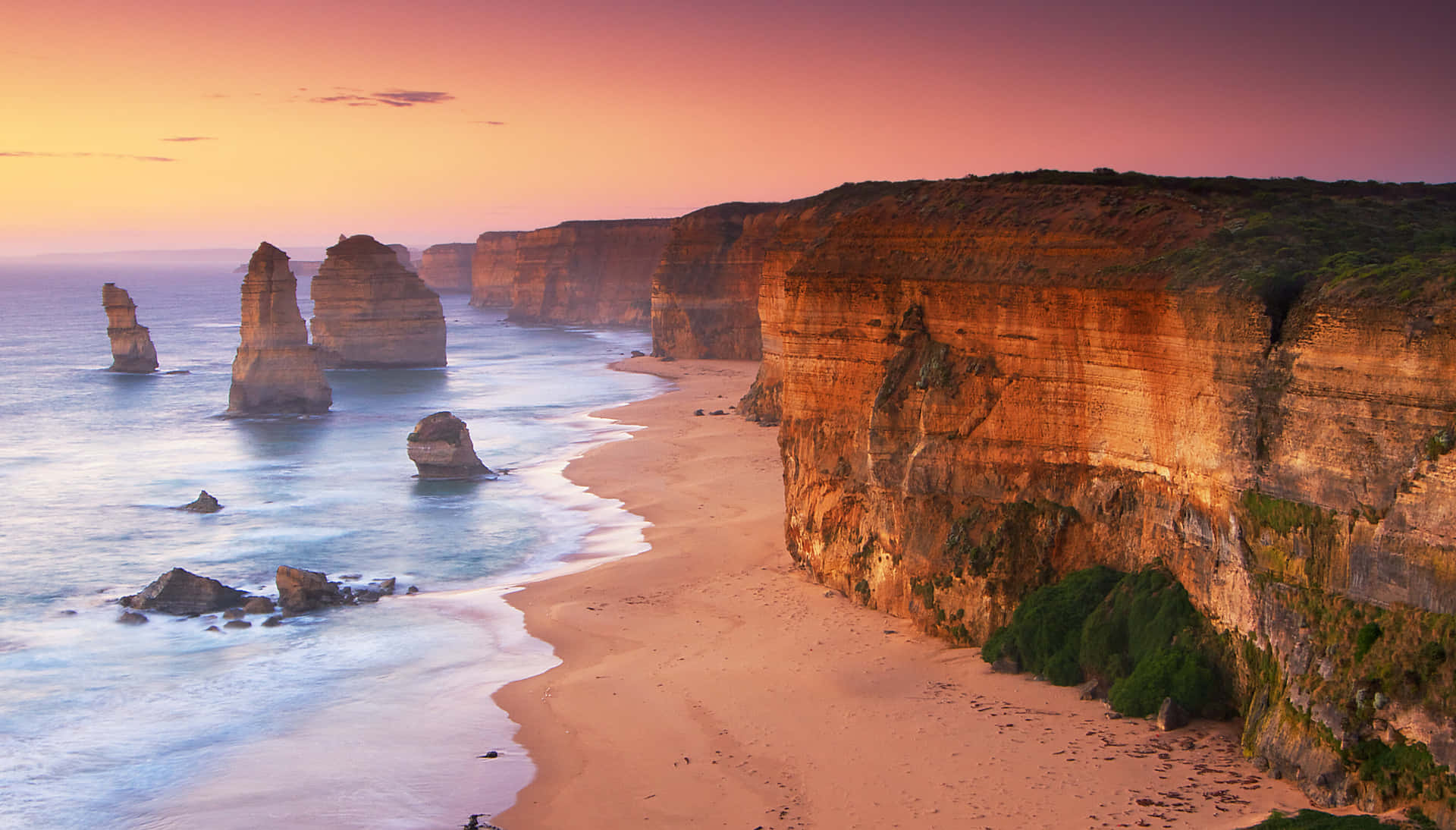 Twelve Apostles In Victoria Australia During Nightfall Background