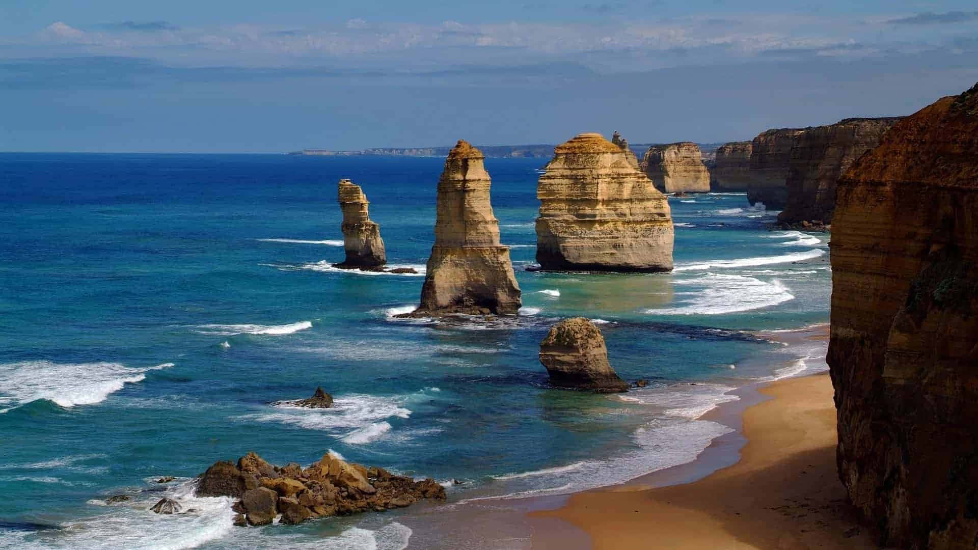 Twelve Apostles In Victoria Australia During Sundown Background