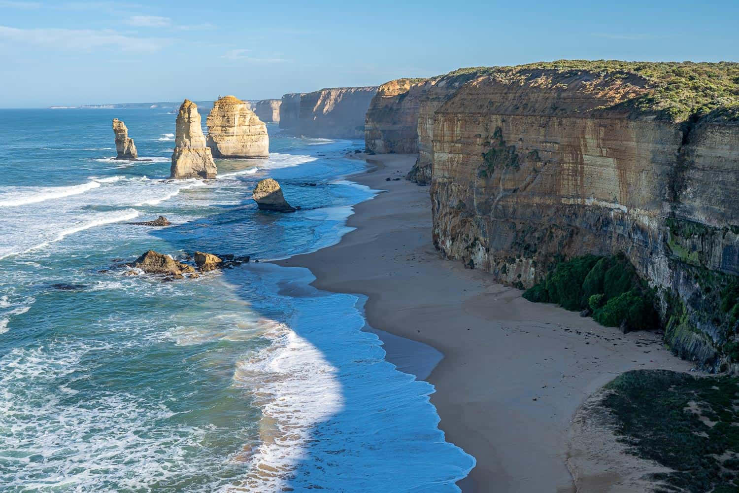 Twelve Apostles In Victoria Australia On A Sunny Day Background