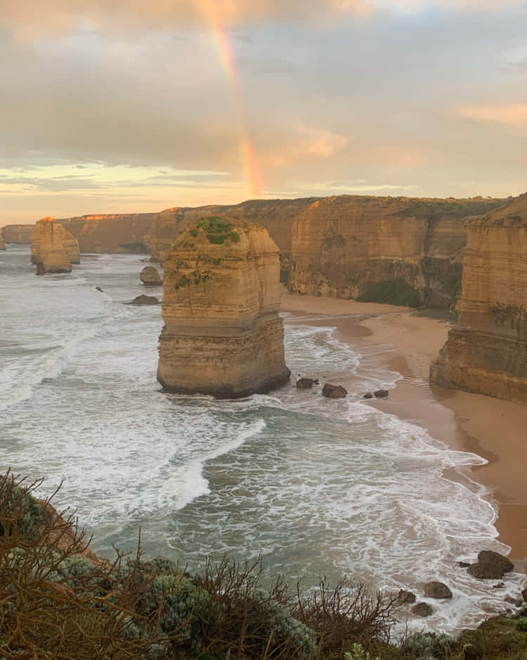 Twelve Apostles In Victoria Australia With Rainbow