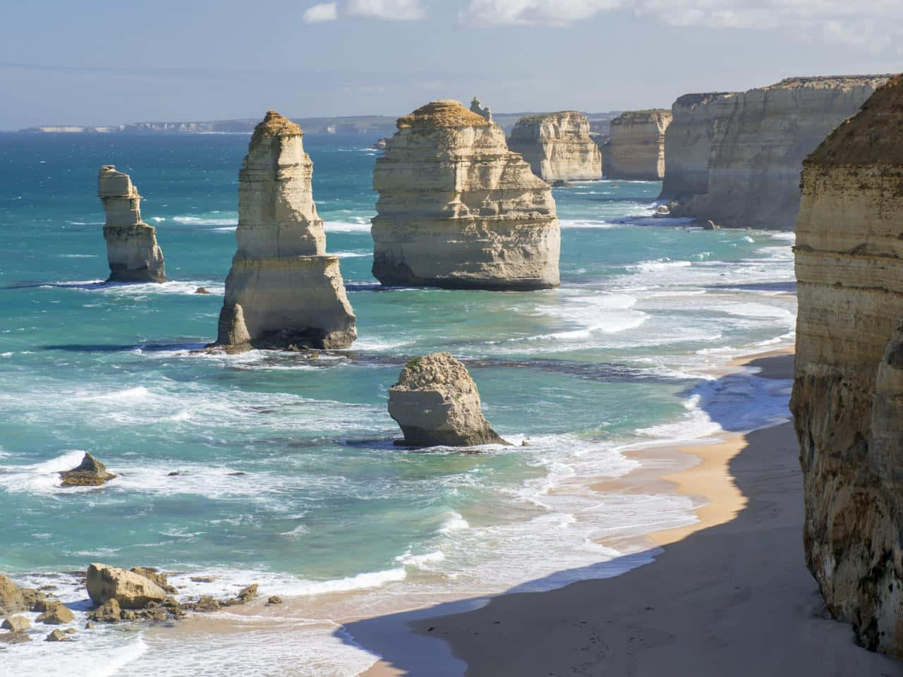 Twelve Apostles In Victoria Australia With Sunbeam Background