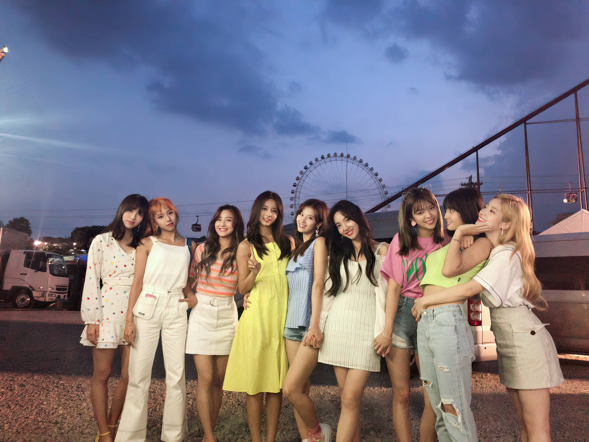 Twice In Dazzling 4k With Mesmerizing Ferris Wheel Backdrop Background