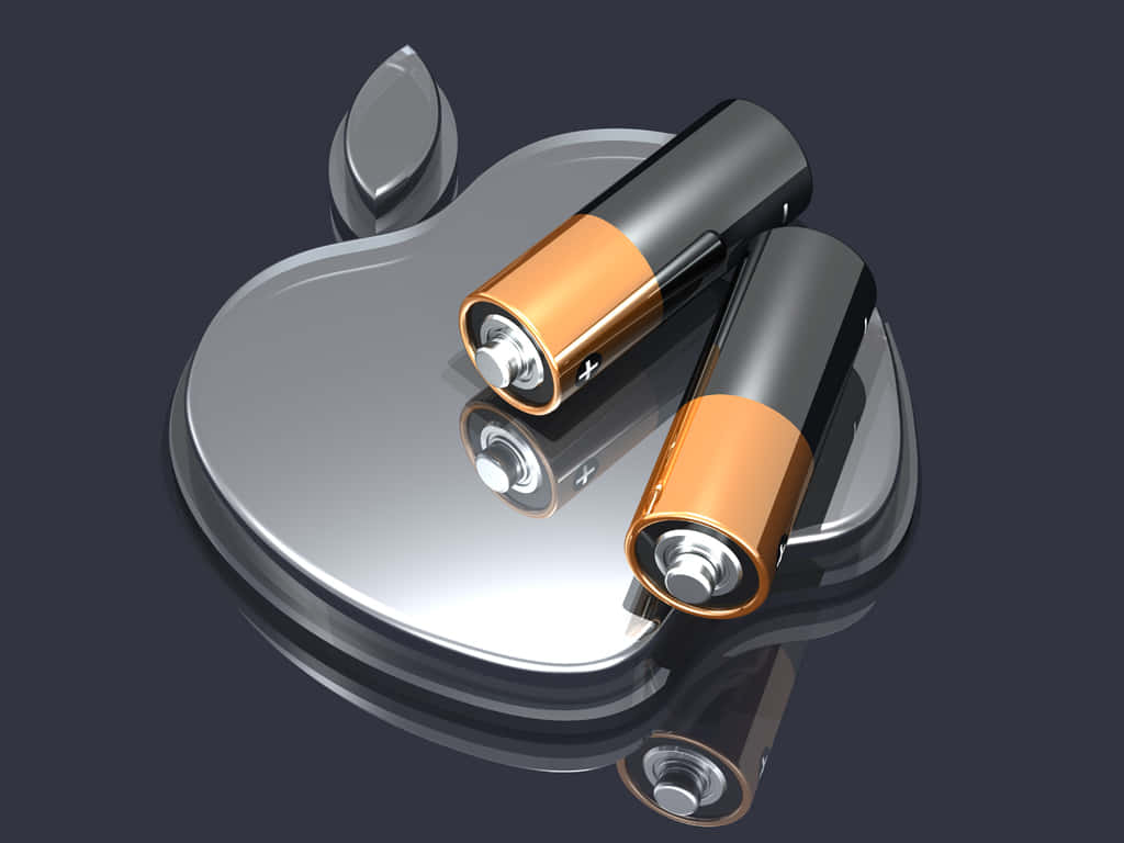 Two Aa Batteries On Apple Logo Background