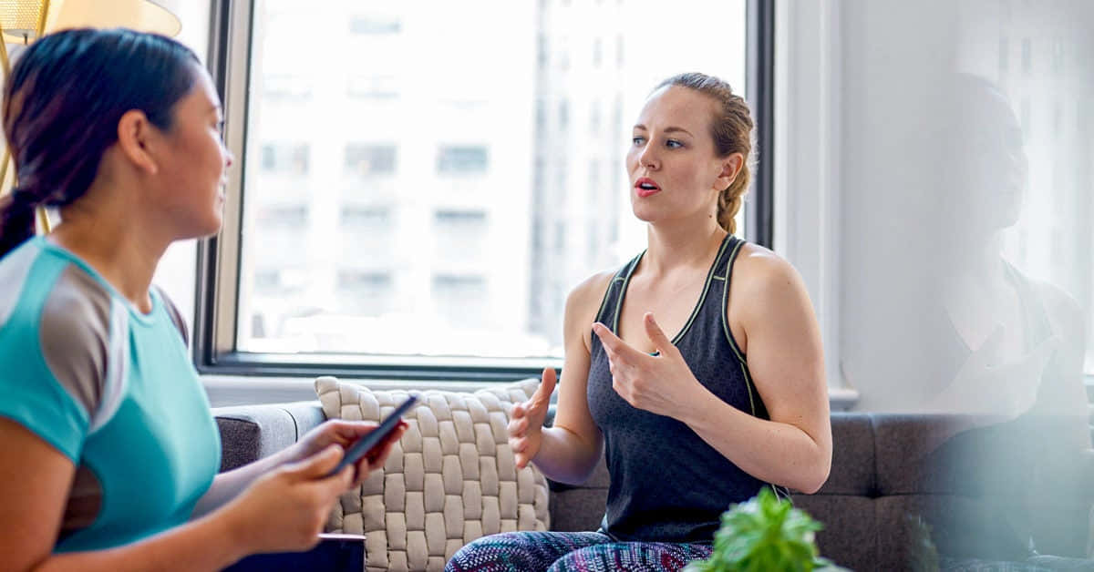 Two Adult Women Talking