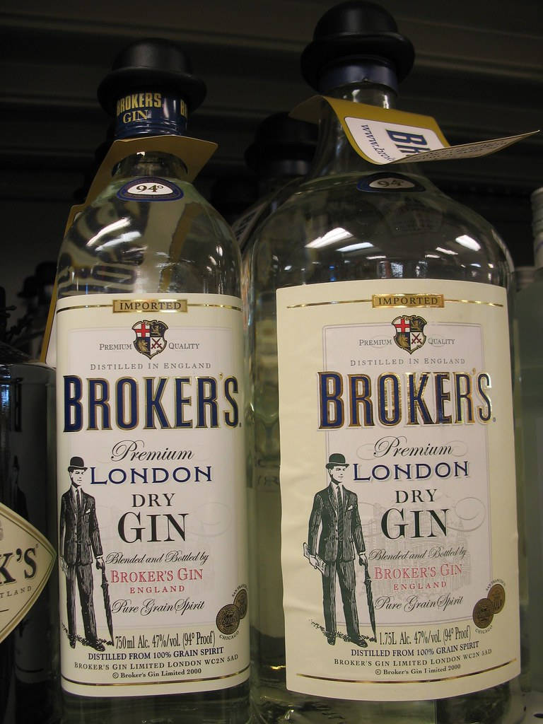 Two Bottles Of Brokers Gin Background