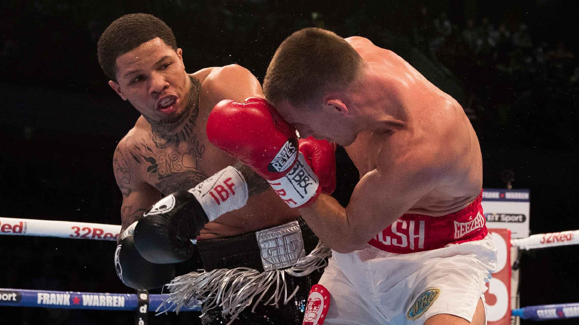 Two Boxers In The Ring Fighting Each Other Background
