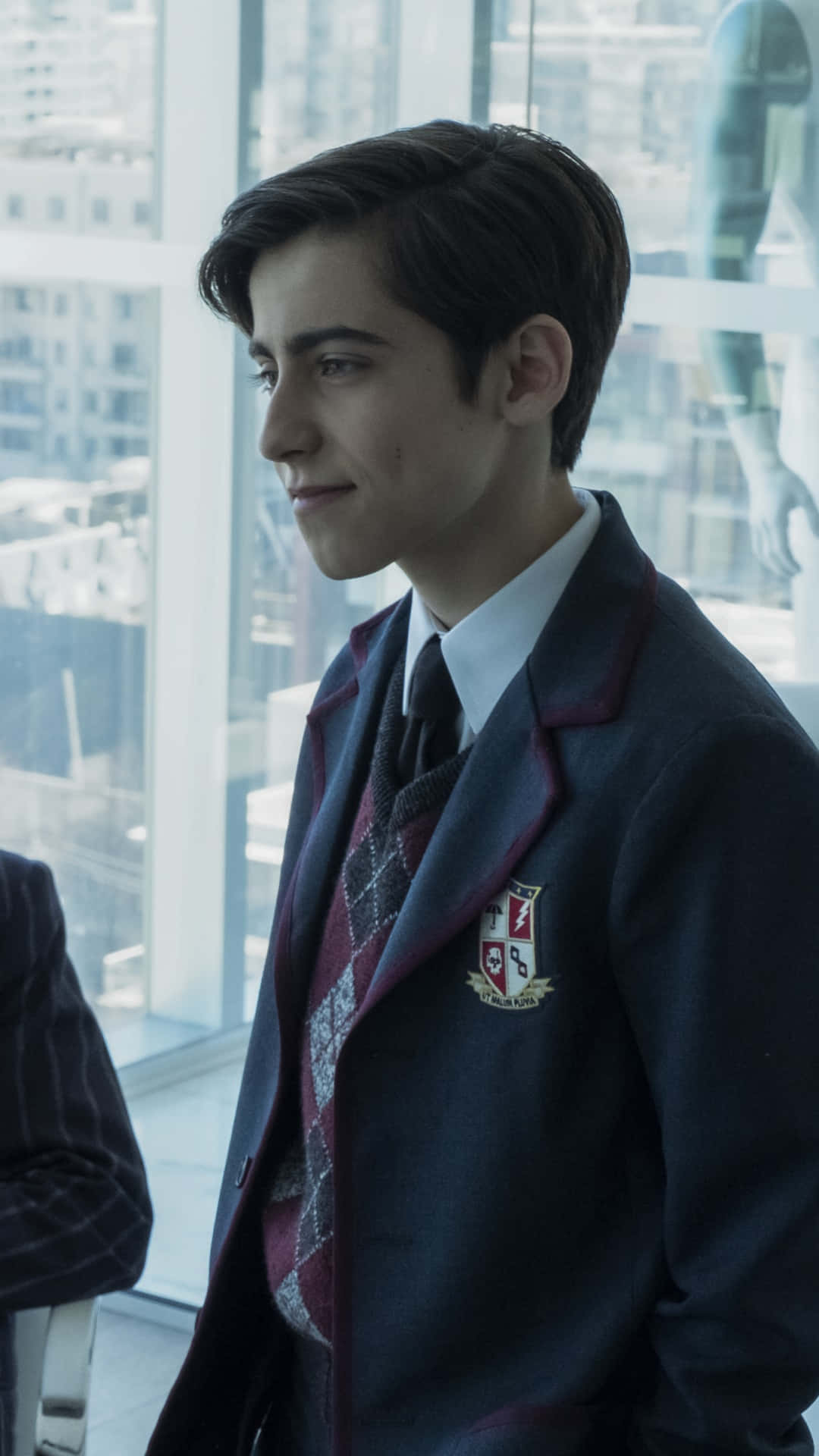 Two Boys In Suits Standing Next To Each Other Background