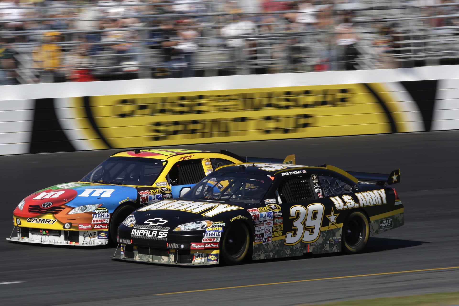 Two Cars On A Race Track Background