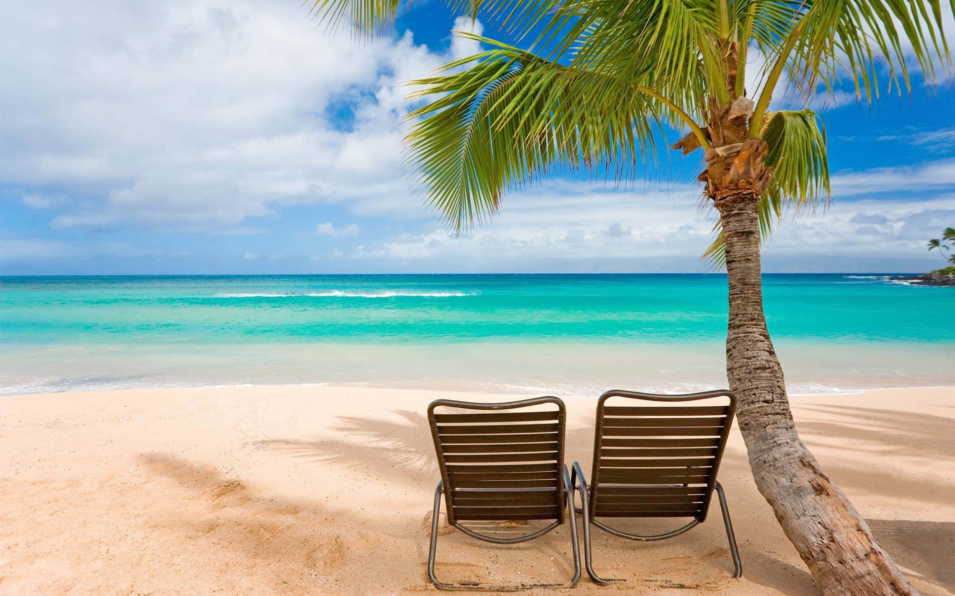 Two Chairs On A Beach