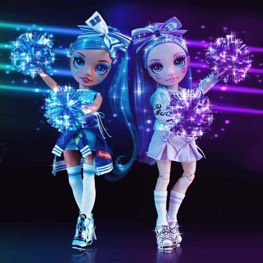 Two Cheerleader Dolls With Blue And Purple Hair Background