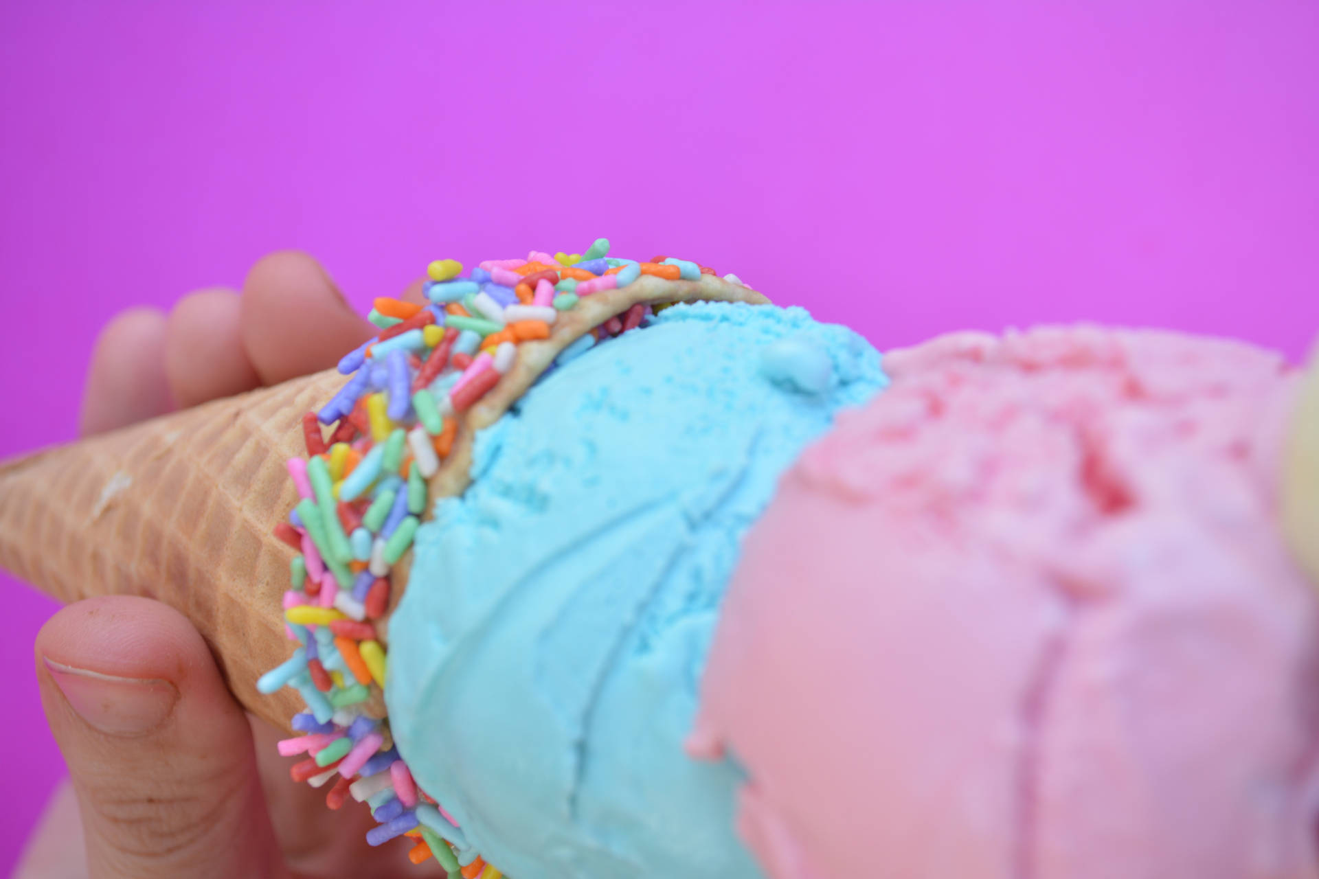 Two Colorful Scoops Of Ice Cream Background