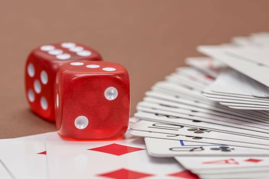 Two Dices And Rummy Playing Cards