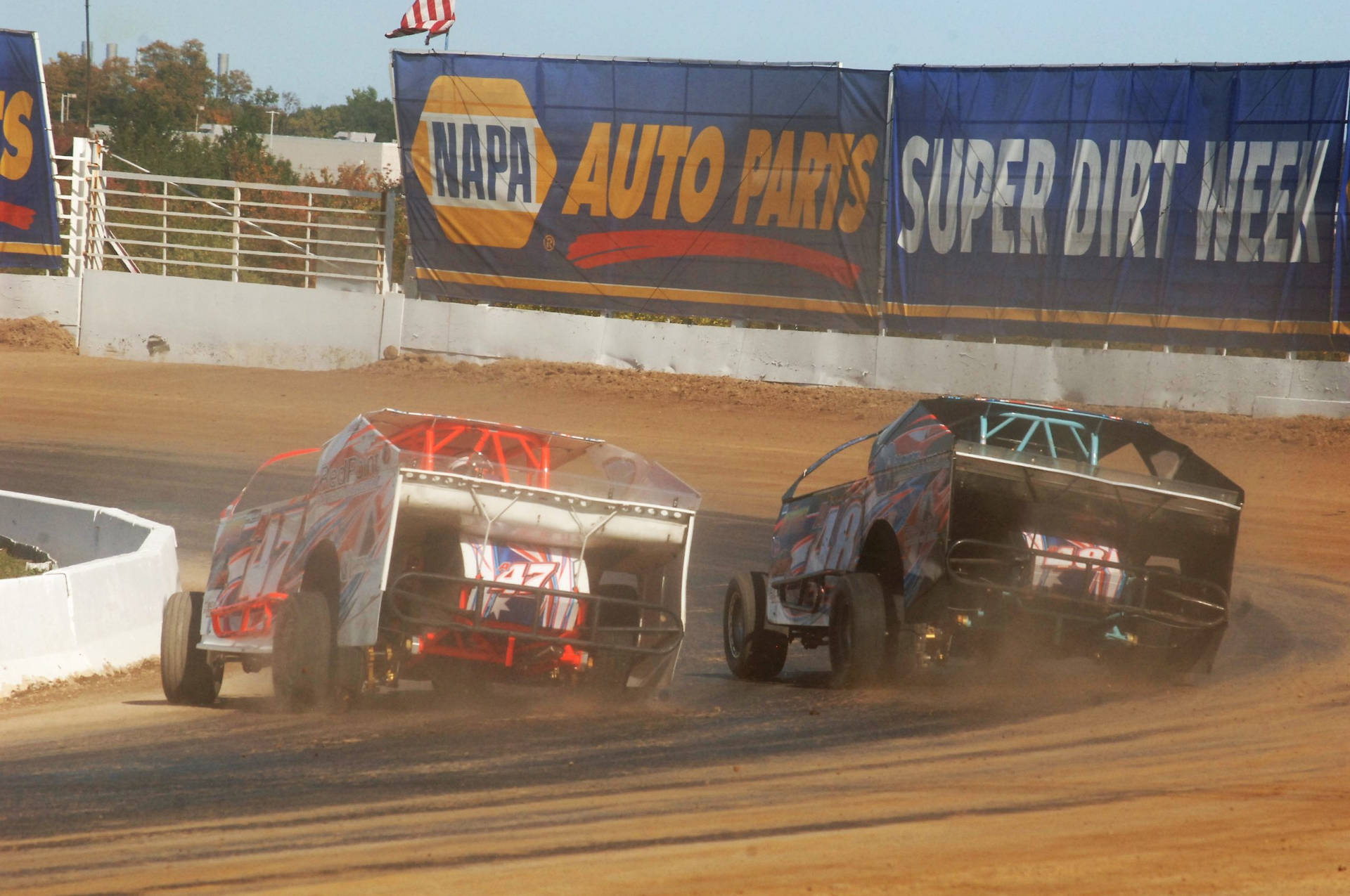 Two Dirt Cars Racing Background