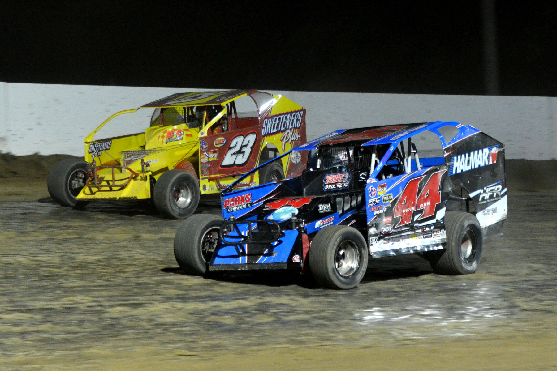 Two Dirt Cars Racing Background