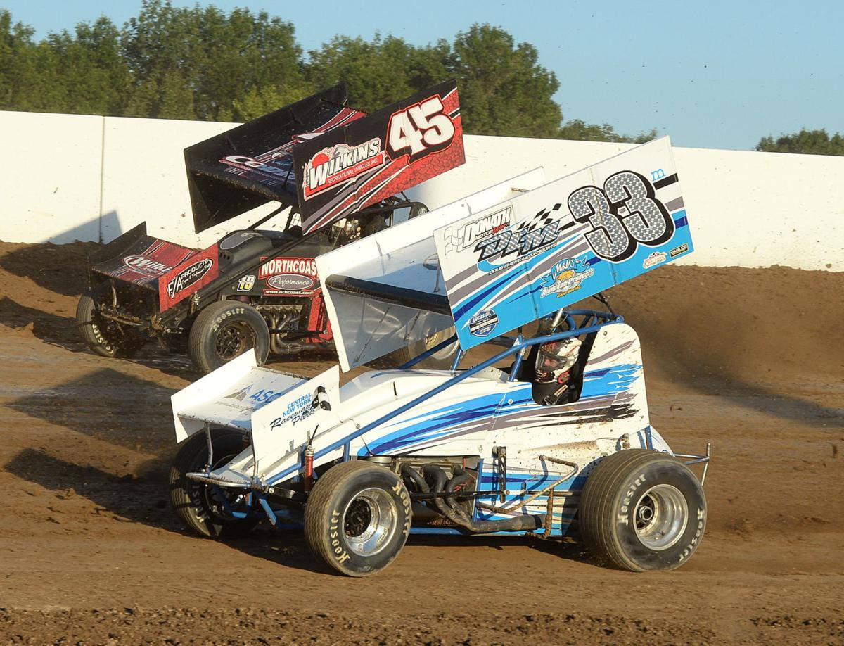 Two Dirt Track Cars Racing Background