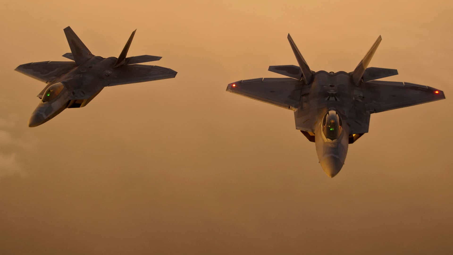 Two Fighter Jets Flying In The Sky Background