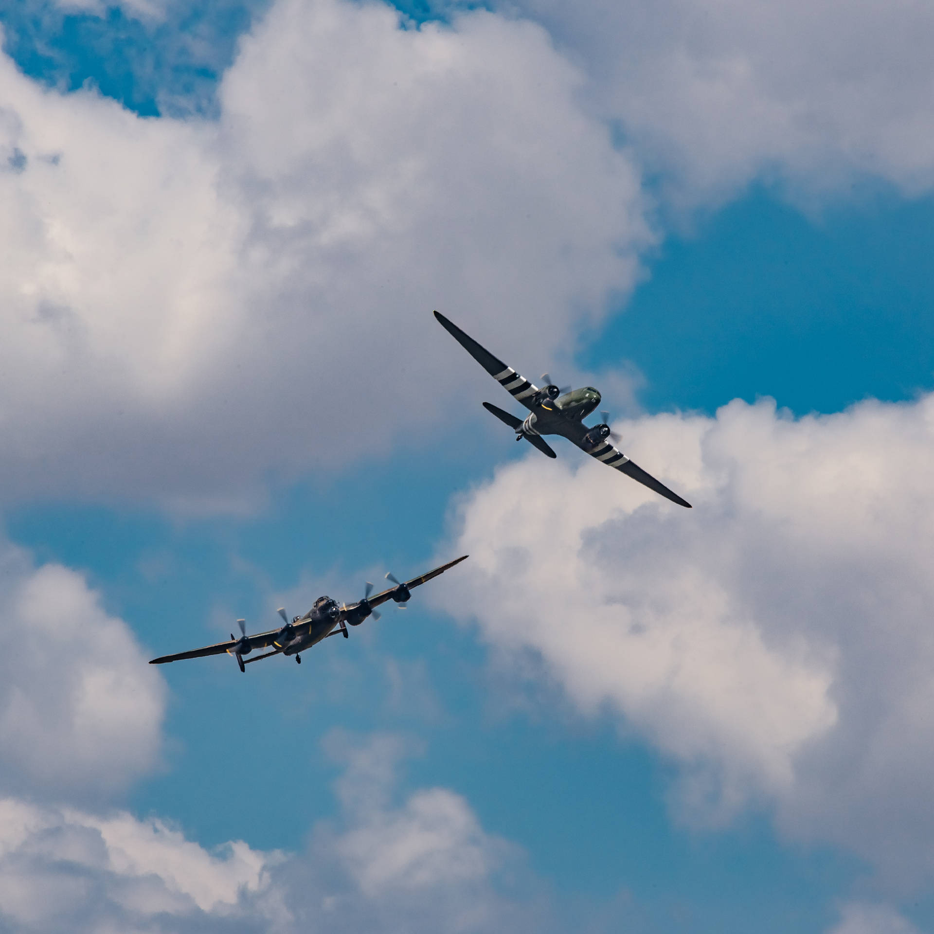 Two Fighter Planes In The Sky Background