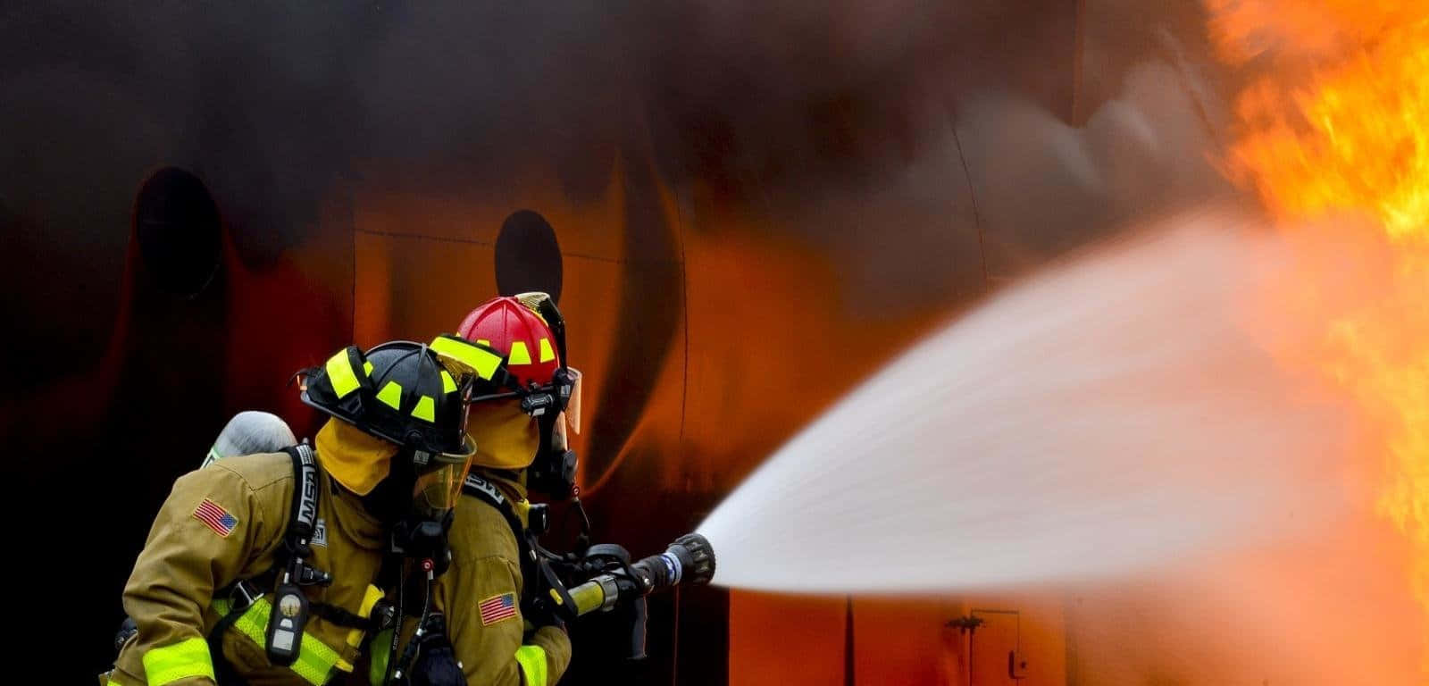 Two Fire Department Officers Killing The Fire Background