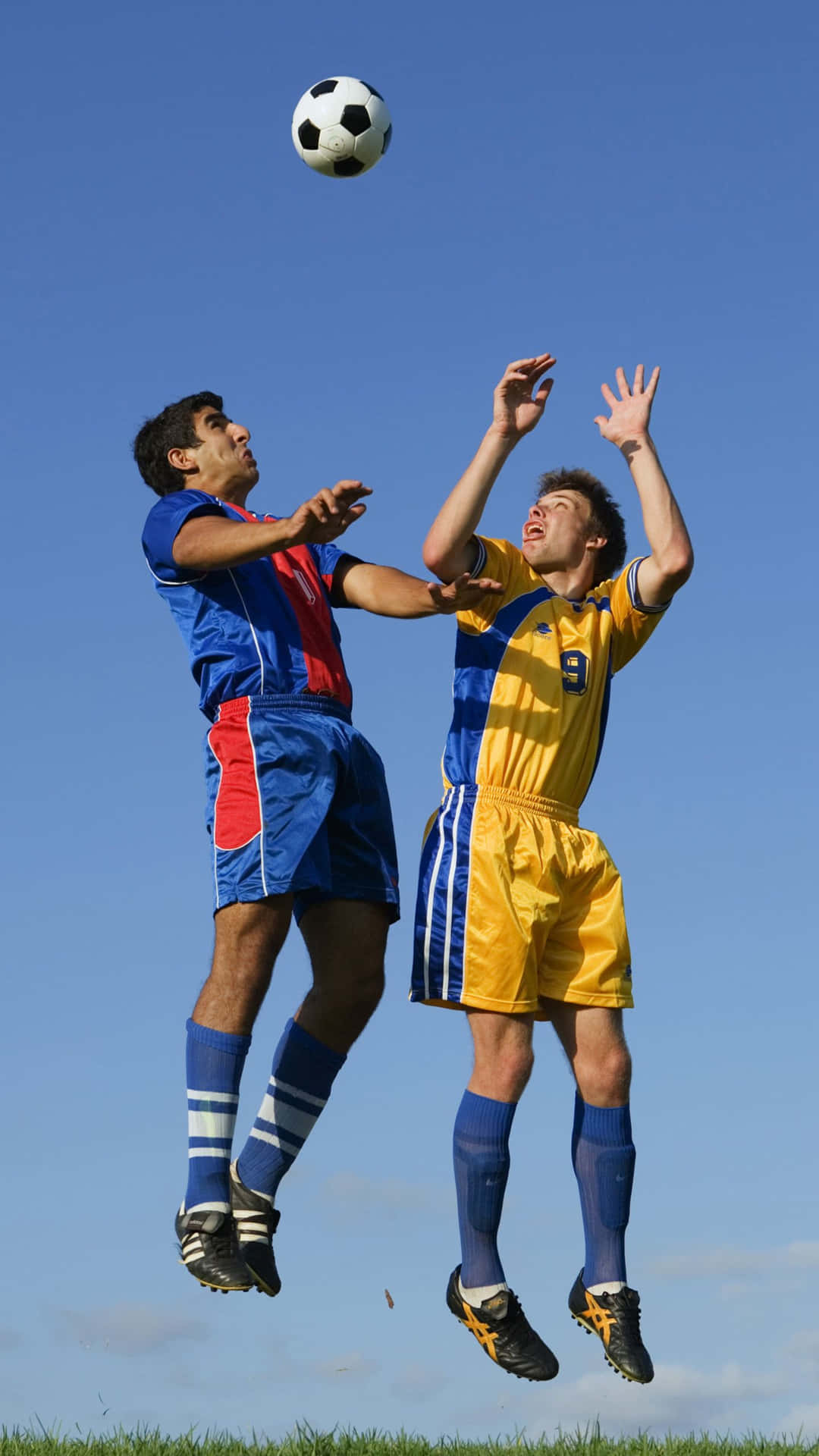 Two Football Galaxy Athletes With Ball Above Background