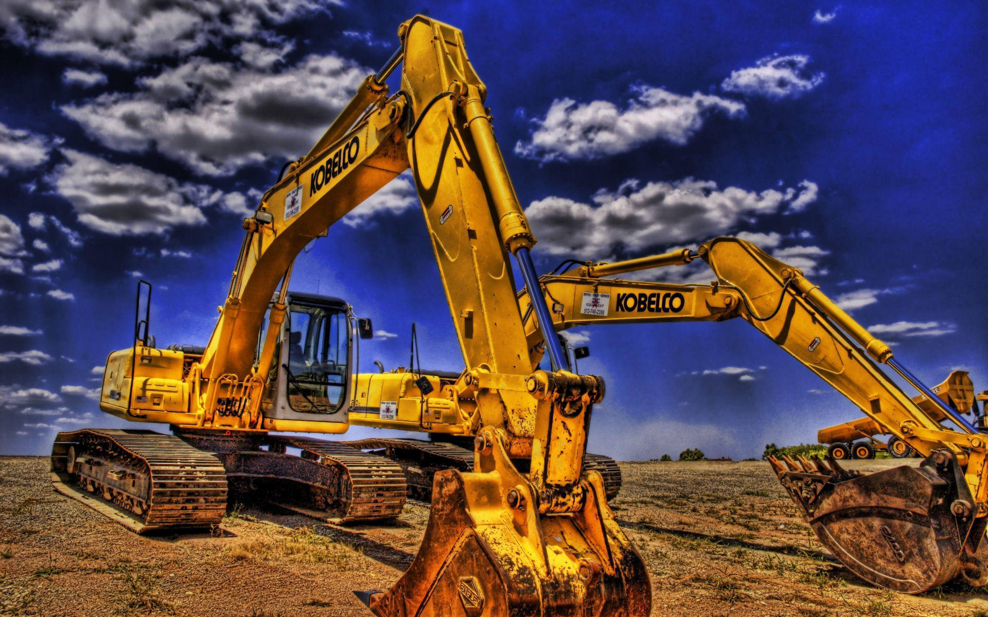 Two Huge Construction Excavators Background