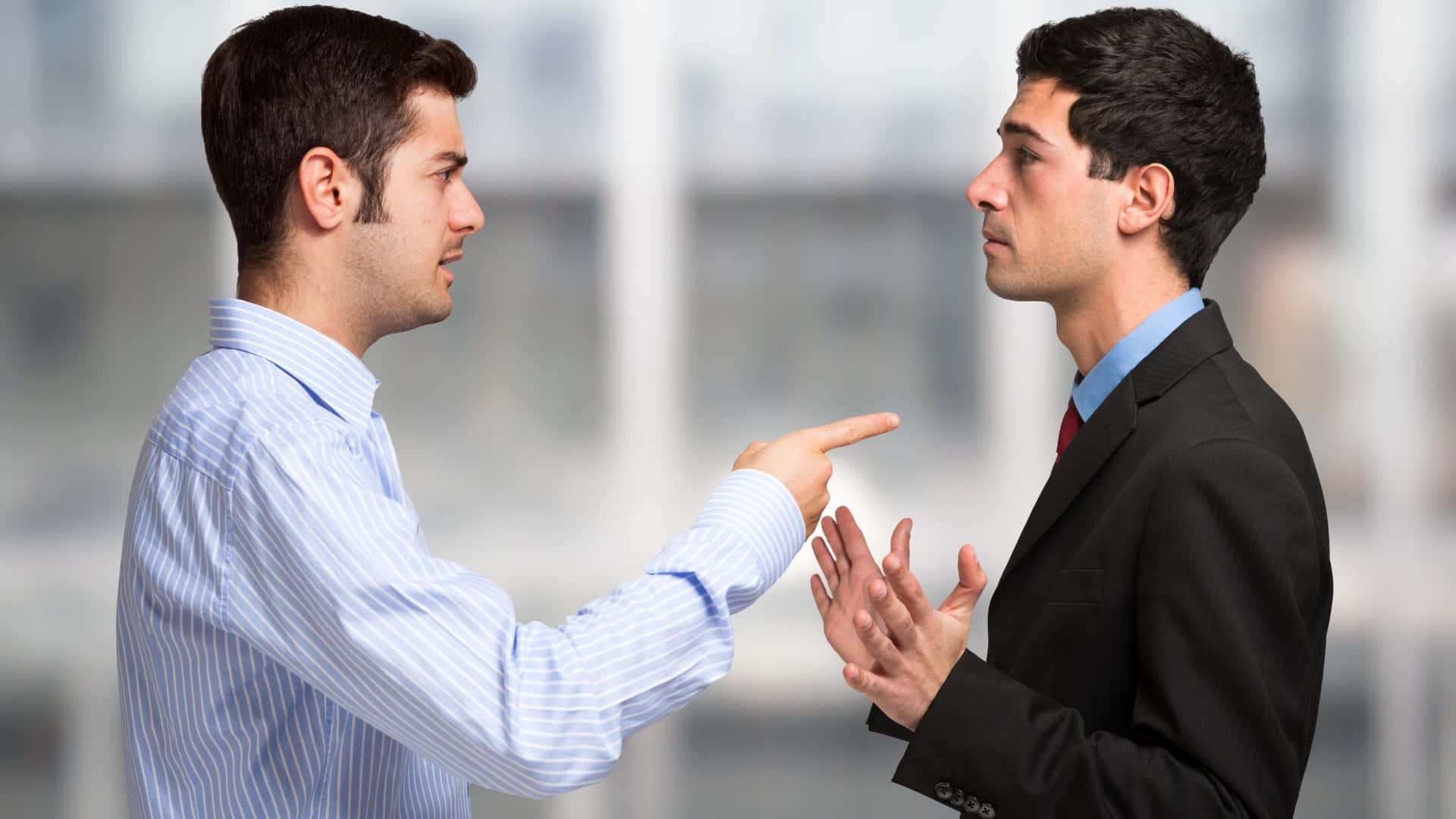 Two Men Disagreeing At Work.jpg Background