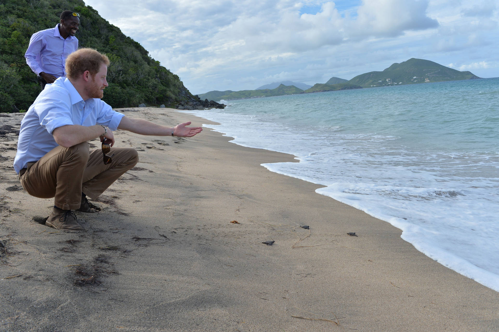 Two Men In St Kitts And Nevis Beach Background