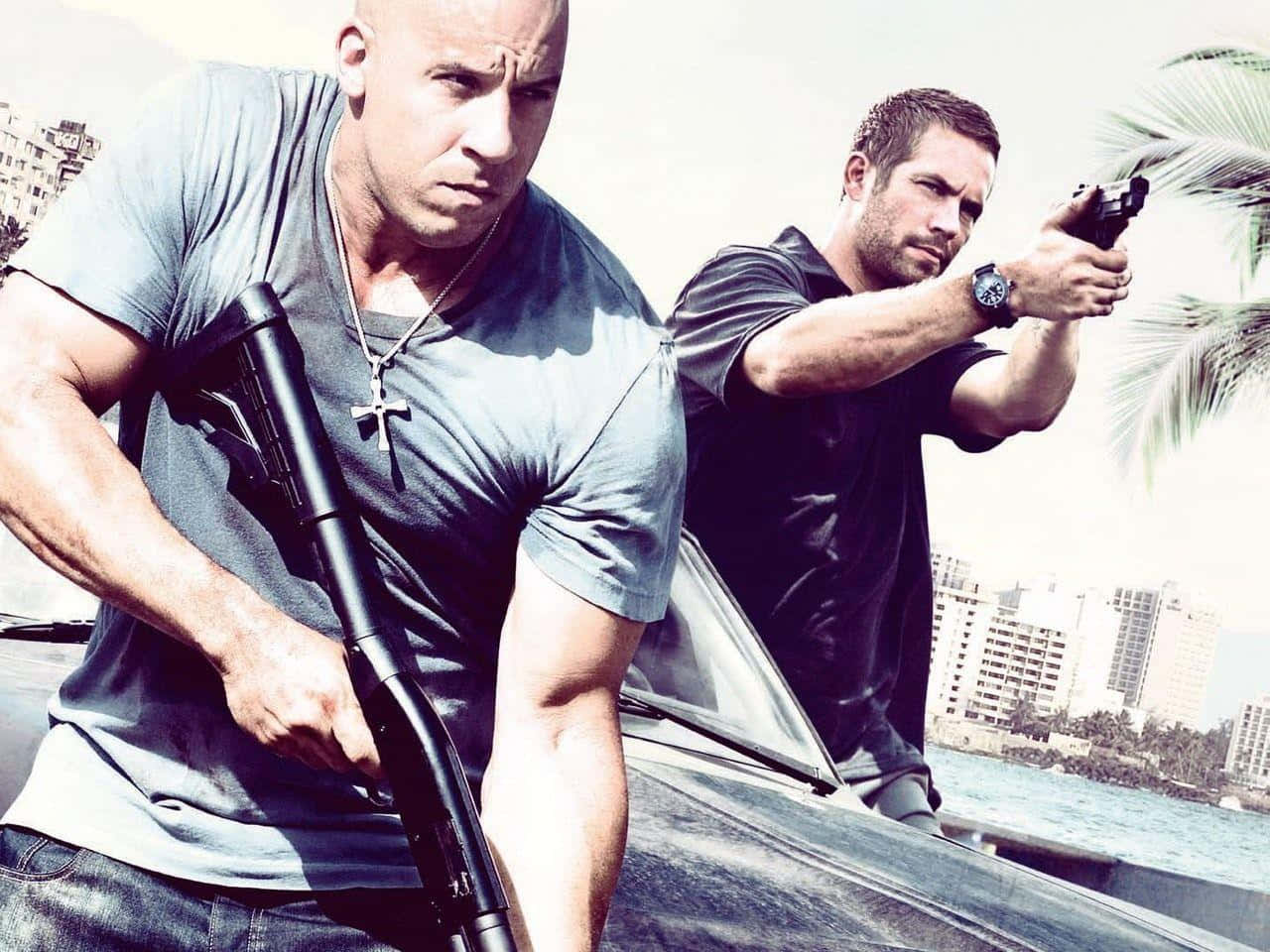 Two Men Standing Next To A Car With Guns Background