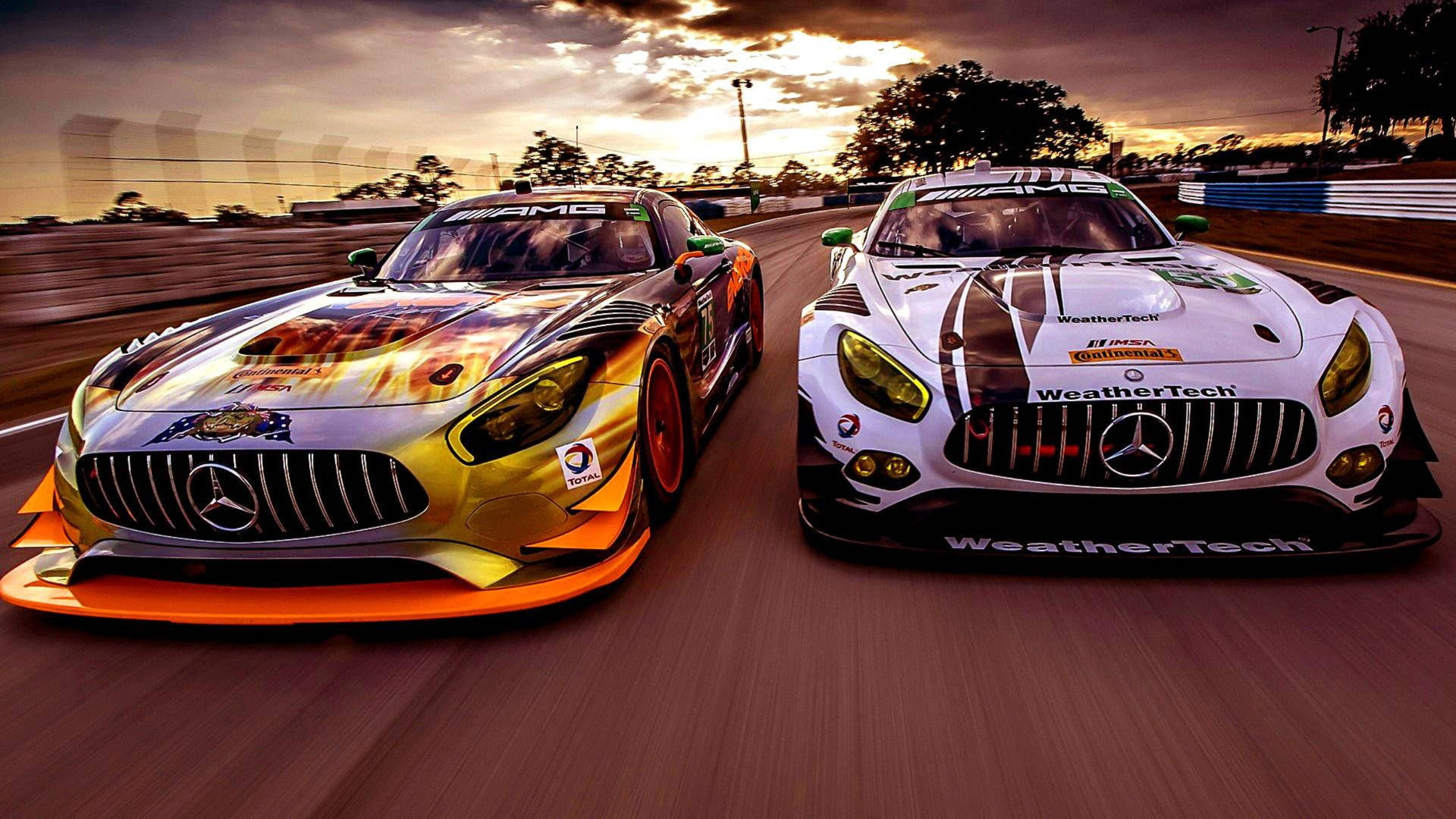 Two Mercedes Benz Racing Cars Background