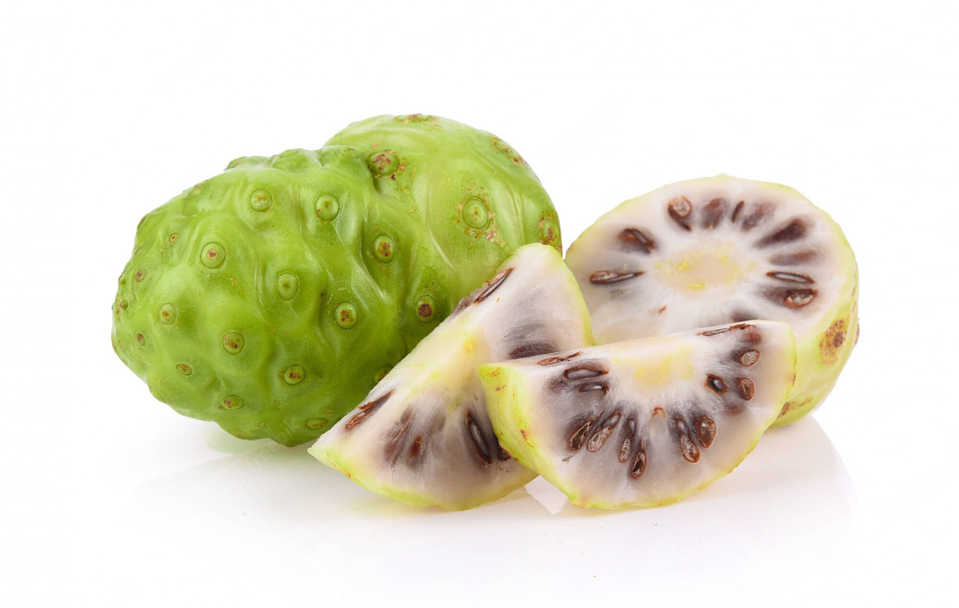 Two Noni Fruits And Slices Background