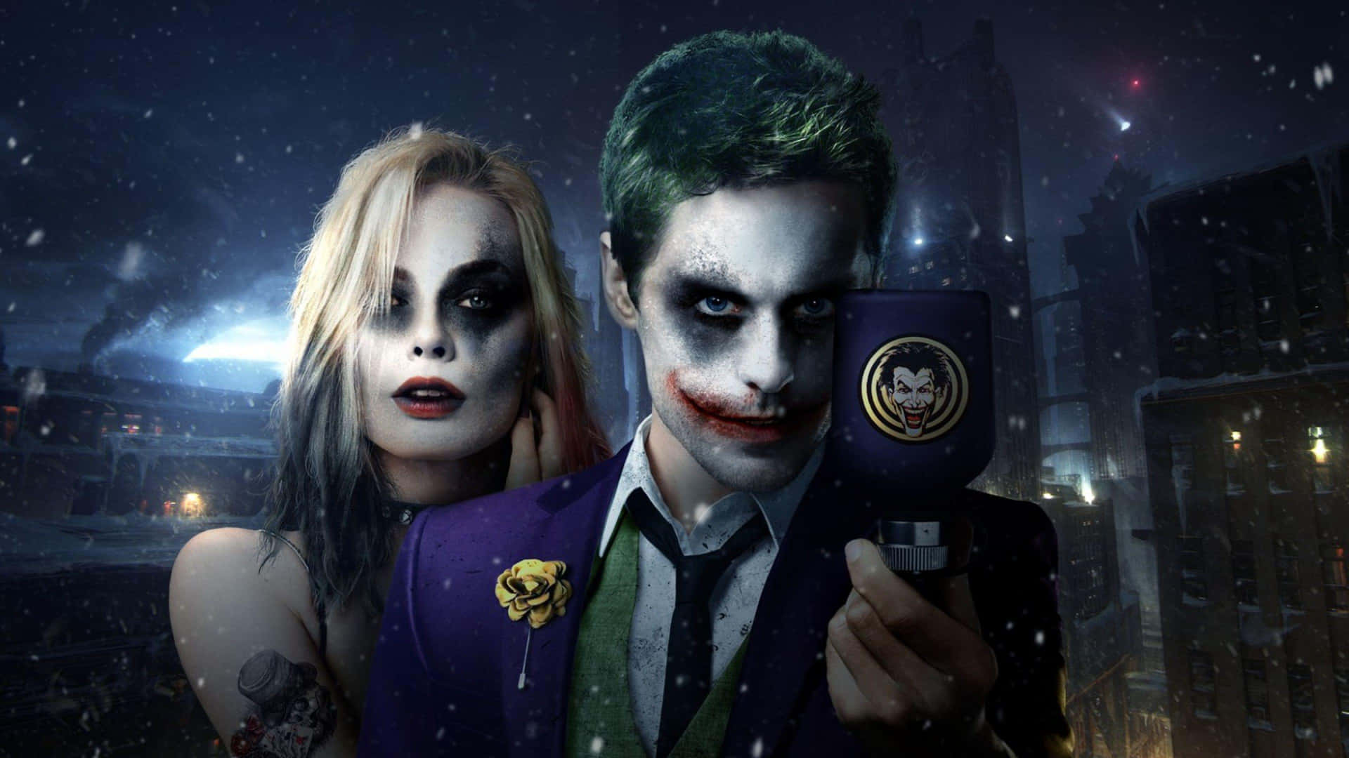Two People Dressed As Joker And Batman Are Holding A Phone Background