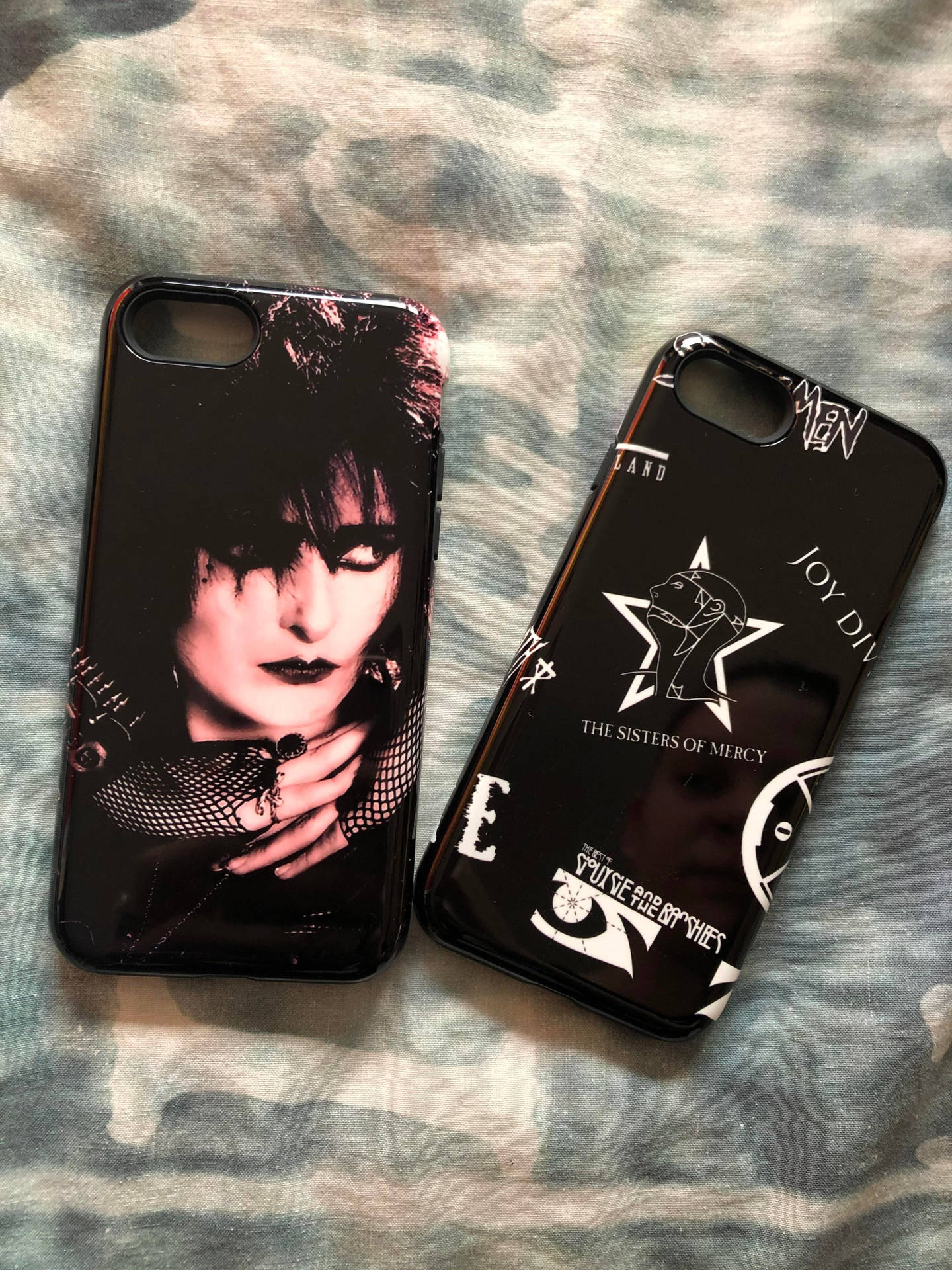 Two Phone Cases With A Black And White Image