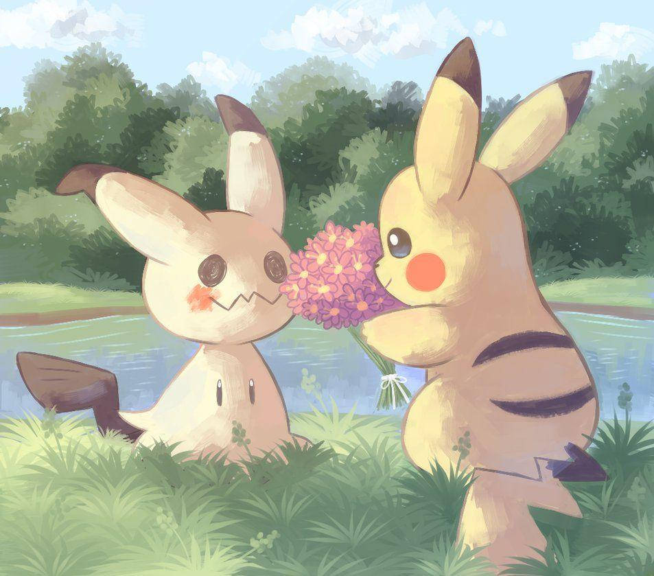 Two Pikachus Are Holding Flowers In The Grass