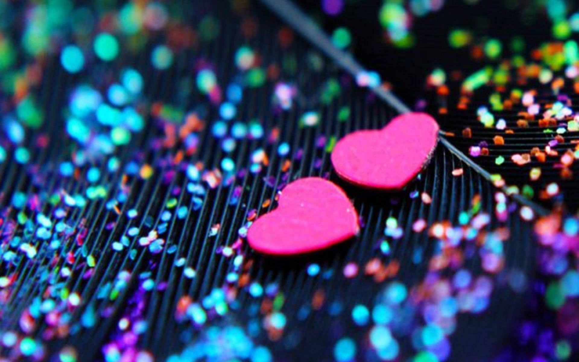 Two Pink Hearts On A Black Background Background