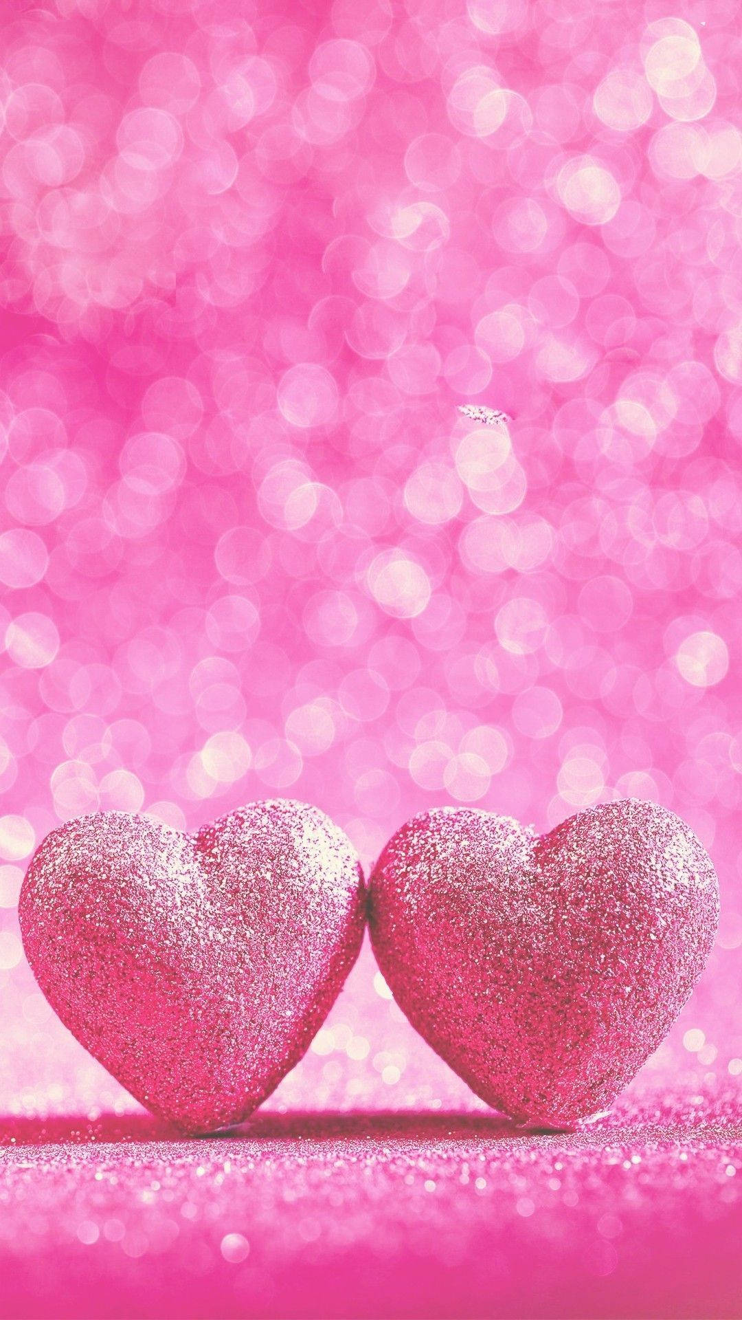Two Pink Hearts Sparkle Background
