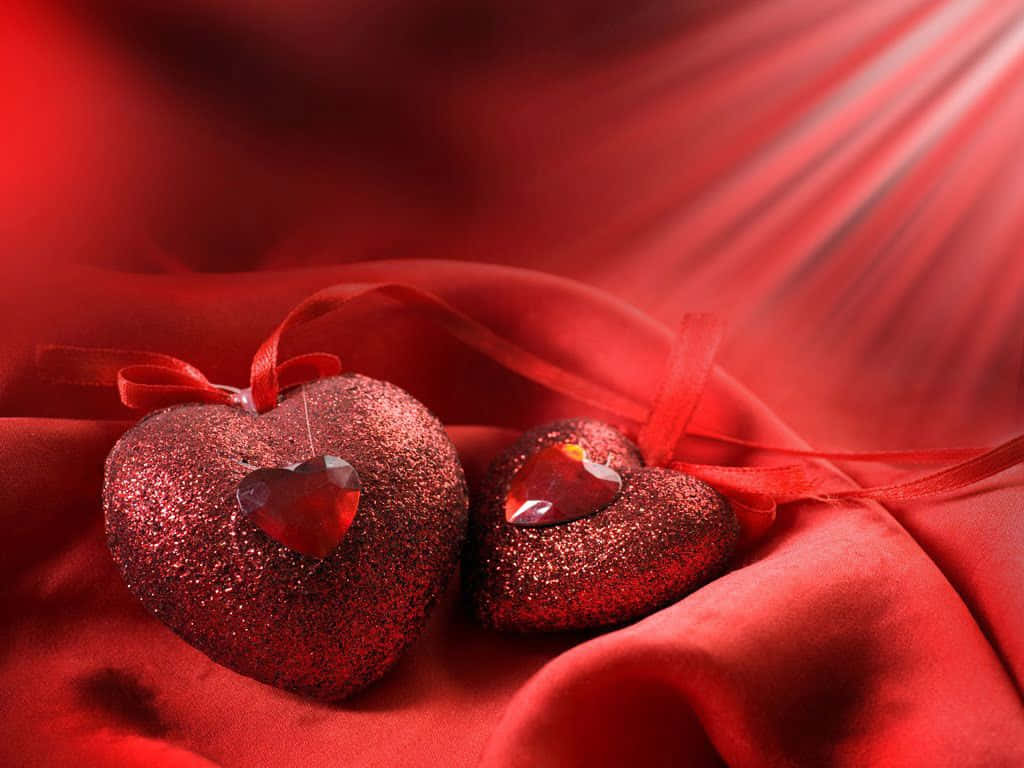 Two Red Hearts On A Red Background Background