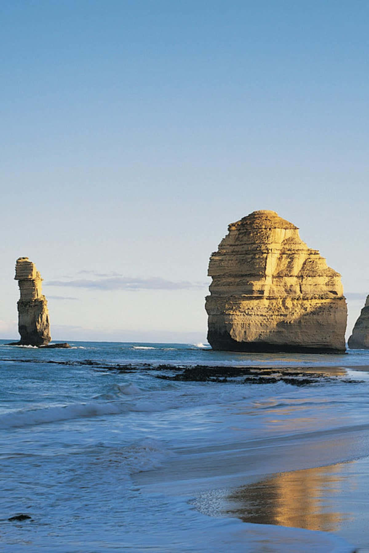 Two Sea Rock Formations In Twelve Apostles Australia Background