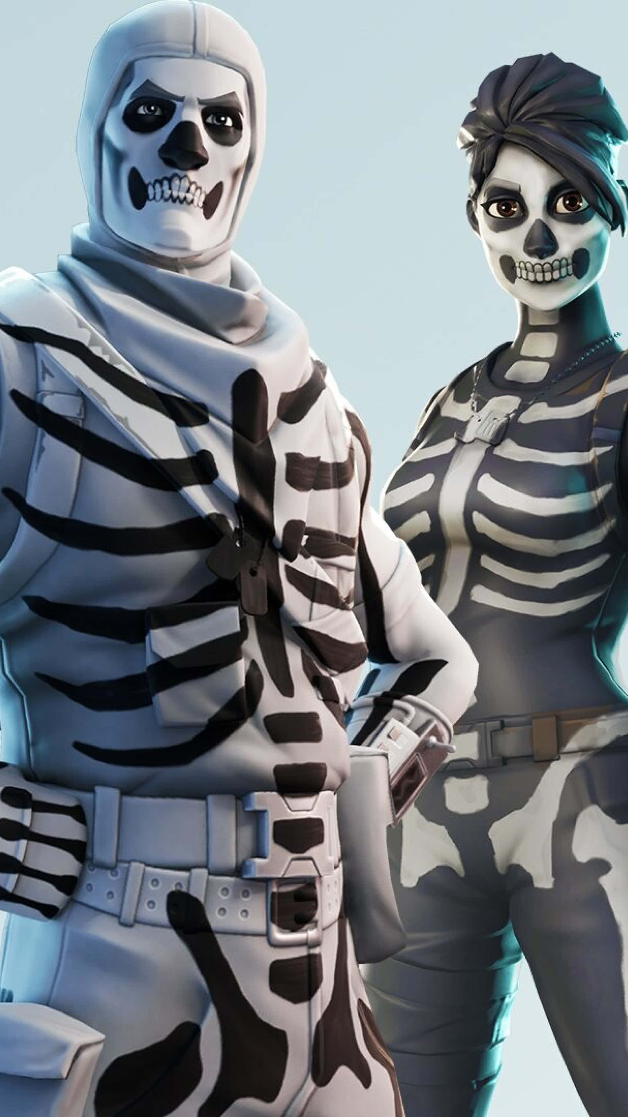 Two Skeletons Standing Next To Each Other