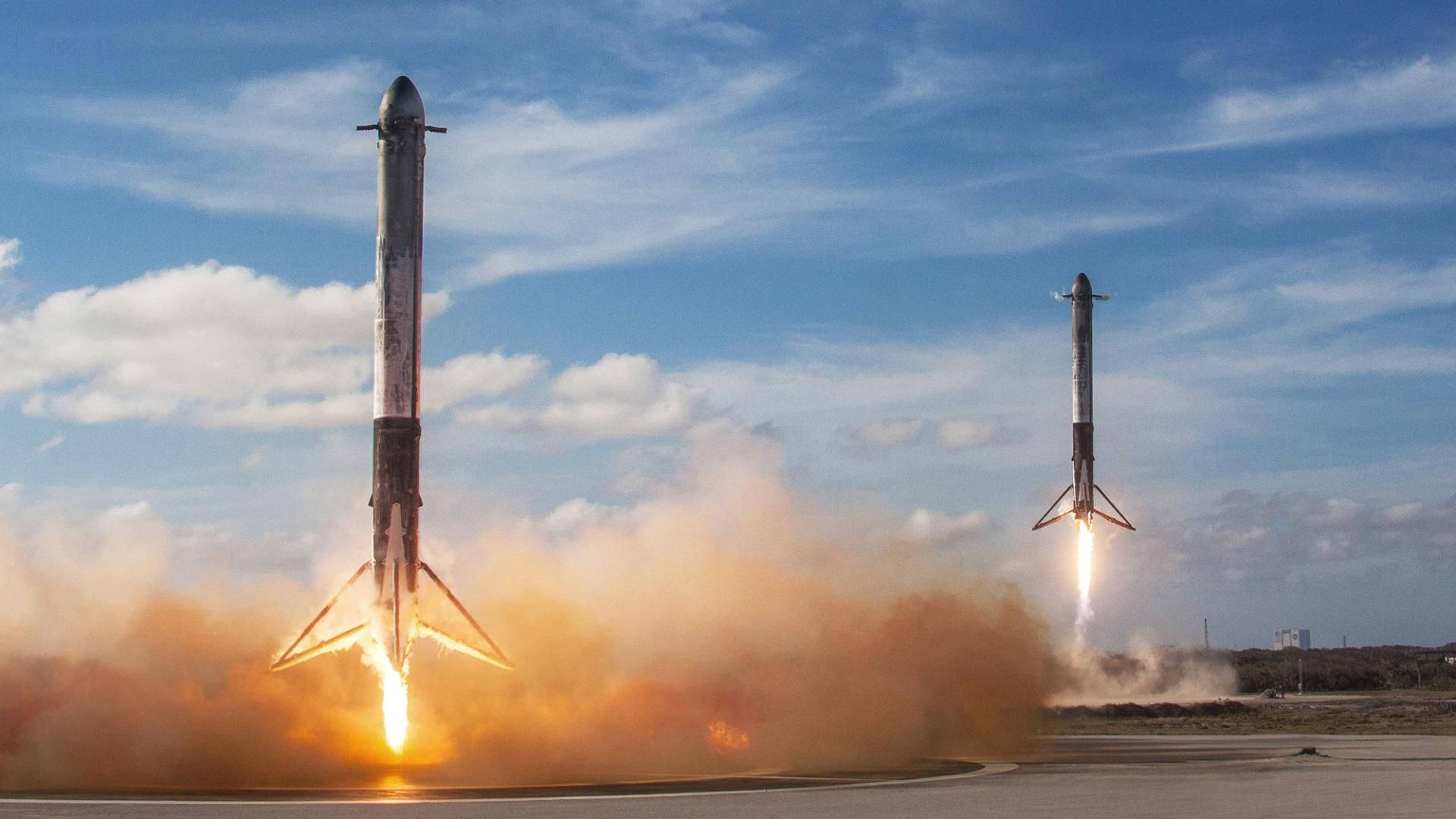 Two Spacex Rockets Background