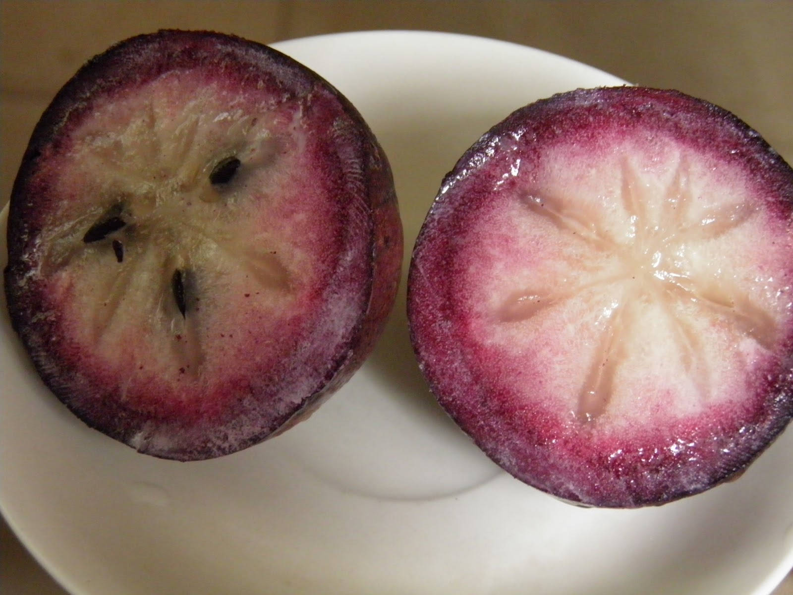 Two Star Apple In Plate Background