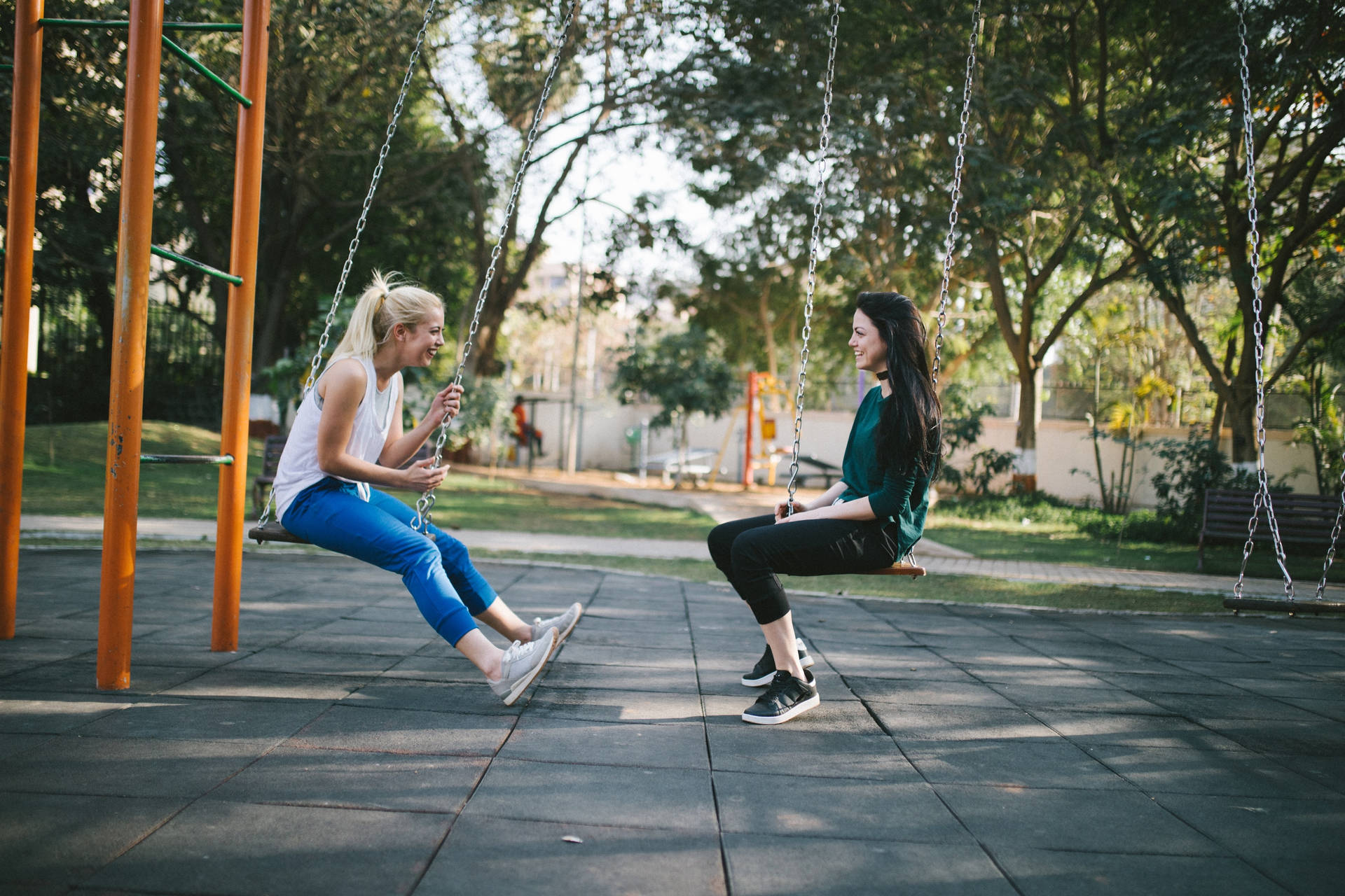 Two Teenage Girls At The Swing Background