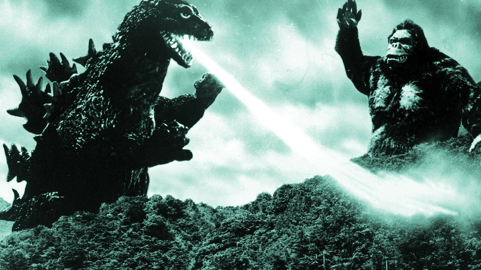 Two Titans Collide – Godzilla And Kong Battle It Out Background