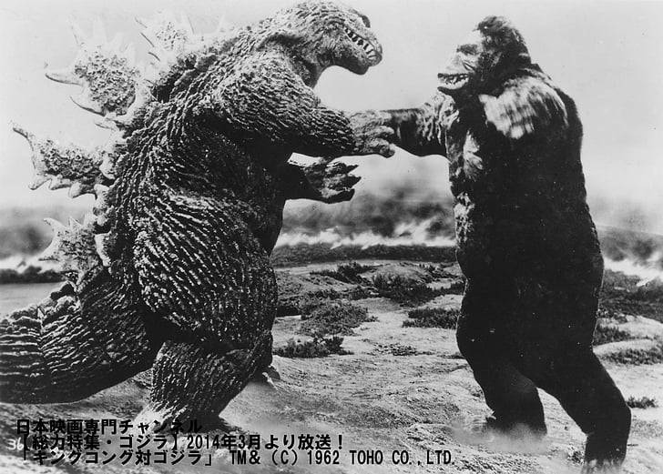Two Titans Of Titanic Proportions Face Off - Godzilla And Kong Battle It Out For Dominance Background