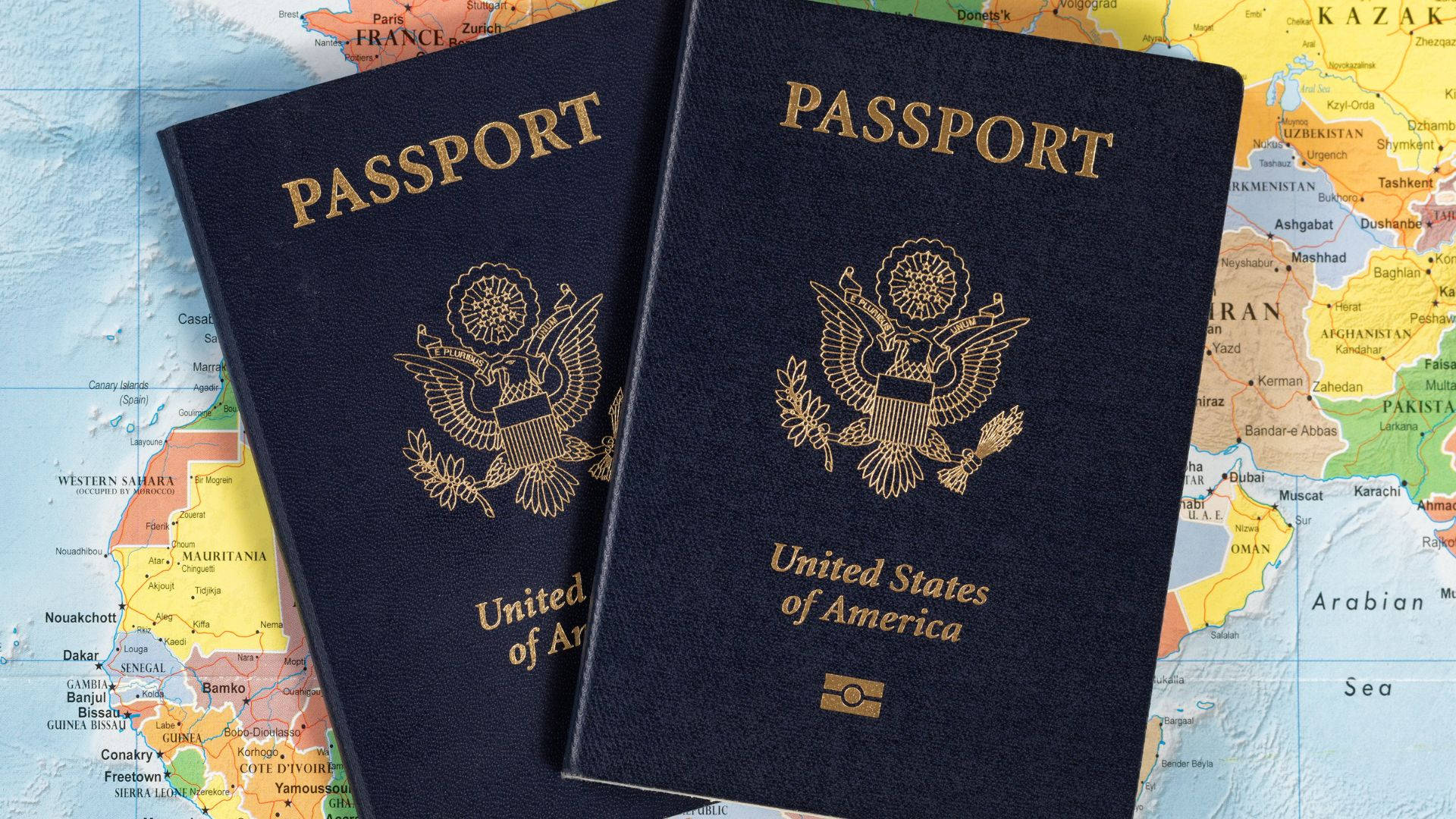 Two Usa Passport On World Map