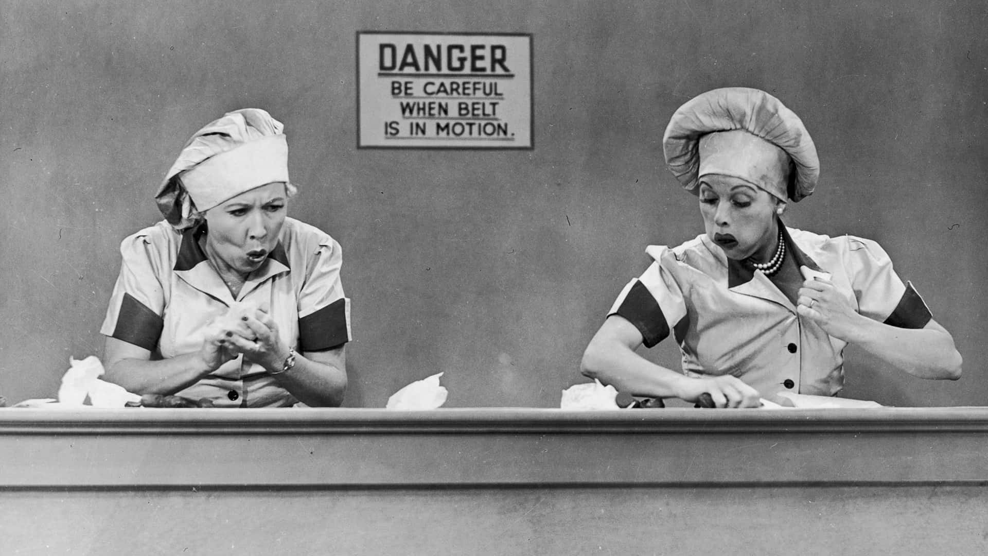 Two Women In Hats Are Sitting At A Table Background