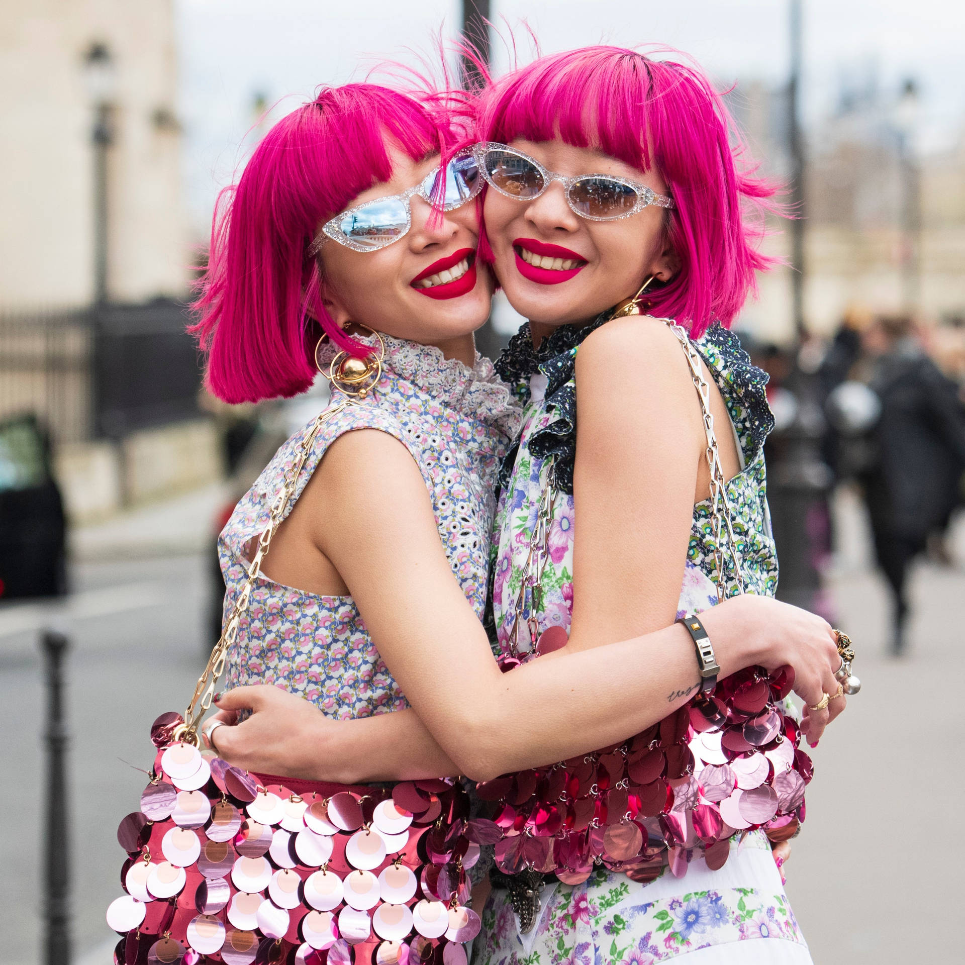 Two Women With Magenta Hair Up-close