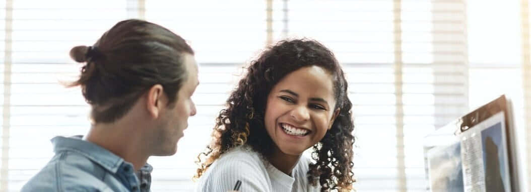 Two Young People Looking Background