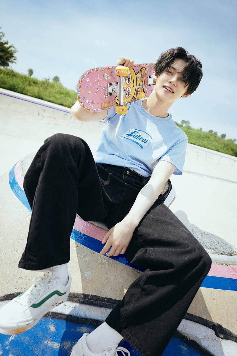 Txt Yeonjun With A Skateboard Background