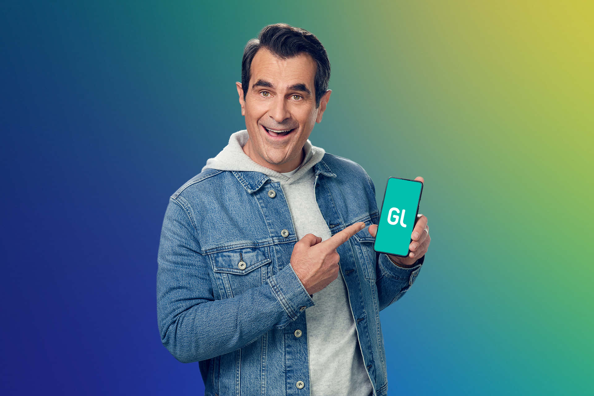 Ty Burrell Posing For A Photoshoot Background