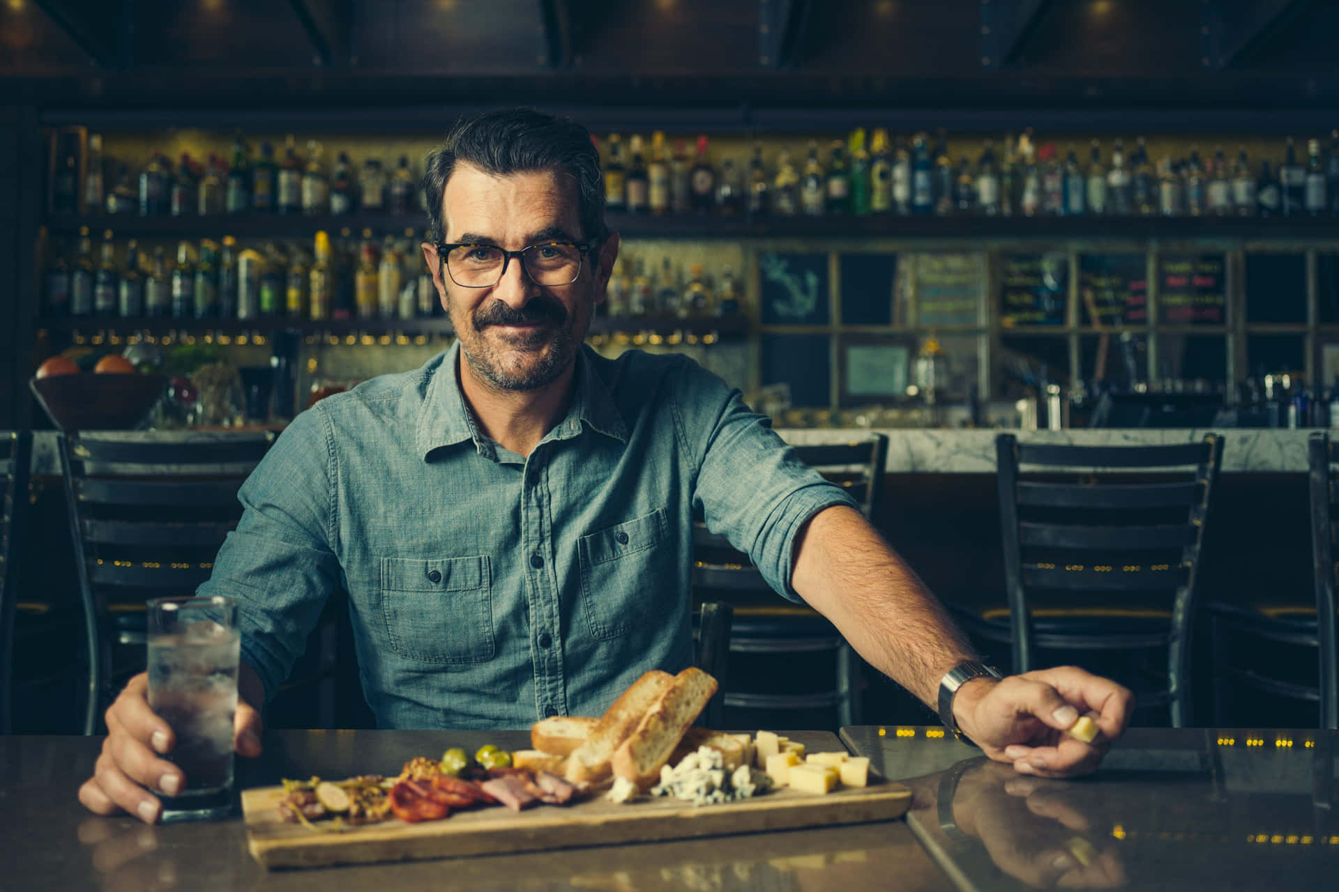 Ty Burrell Smiling In A Casual Outfit Background
